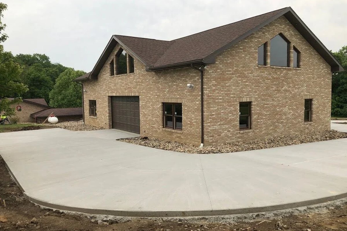 A custom brick home built by HGR Homes